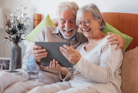 A marriage of grandparents using video call apps